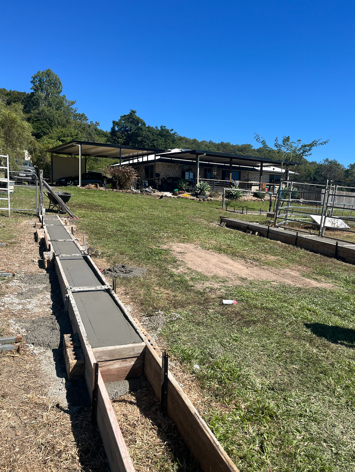 Formed and poured concrete path strip on an acreage property